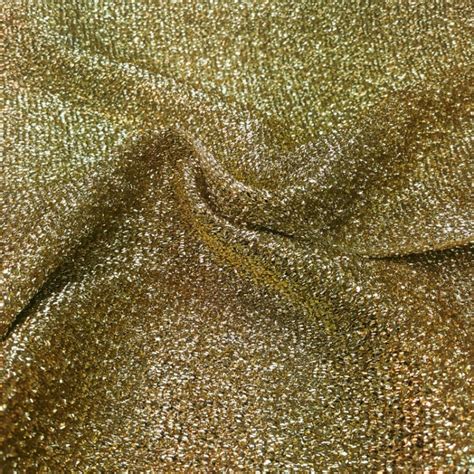 shimmering metallic gold fabric|sparkly gold fabric.